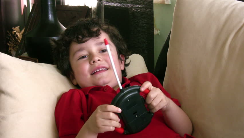 Little boy playing video games