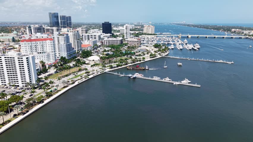 Aerial: West Palm Beach downtown cityscape in the day in Florida, USA, establishing drone shot