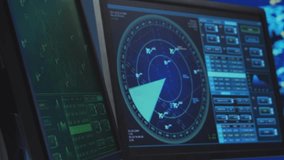 Professional air traffic controller in the control tower. Aircraft control officer works using radar, computer navigation and digital maps. Close-up portrait. - Powered by Shutterstock - Get 15% off with code: PIKWIZARD15