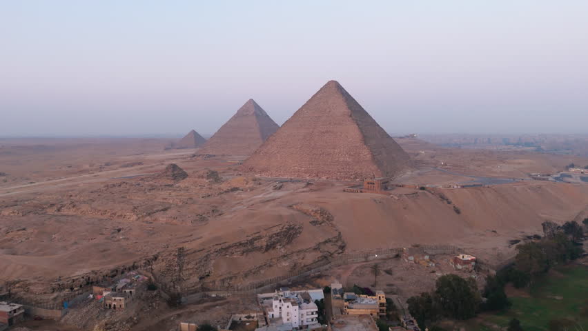 Giza Necropolis Pyramids And Eastern Cemetery In Cairo, Egypt. - aerial shot