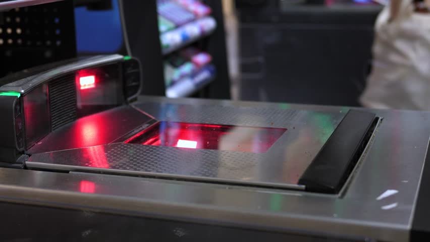 Shopper scanning groceries at self service kiosk, efficiently processing items using automated barcode technology in modern retail environment - Powered by Shutterstock - Get 15% off with code: PIKWIZARD15