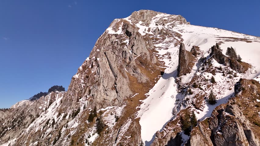 Mountain peak covered in snow Fronalpstock Switzerland Swiss Alps nature lands