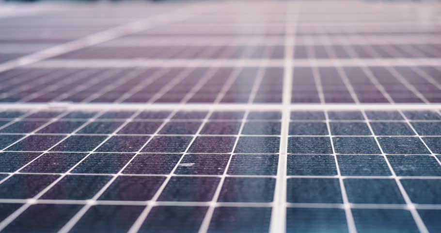 Closeup, solar panel and green energy, sustainable electricity and clean production. Photovoltaic cell, grid and generation at renewable power station, alternative system and eco friendly on roof