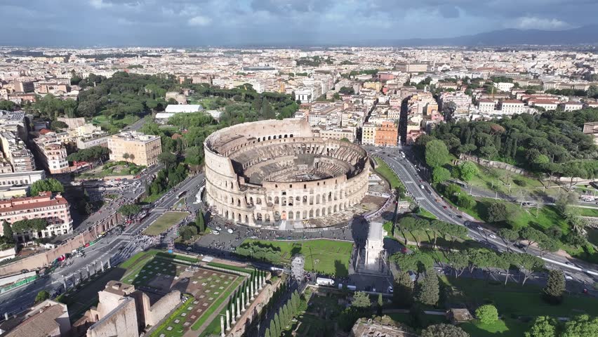 Rome Coliseum At Rome In Lazio Italy. Medieval Buildings. Downtown District. Rome Coliseum At Rome In Lazio Italy. Archaeological Park. Cultural Heritage. Italy Skyline.