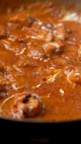 Butter Chicken Preparation - Cream drizzle on Butter Chicken 