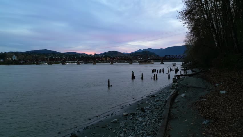 Mission Bridge at Dusk with Pink and Purple Sky, Fraser River, BC, Canada