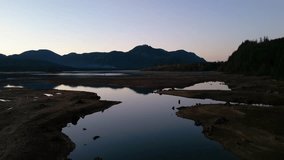 Sunrise Over Stave Lake in British Columbia: Mountain Reflections in Calm Waters - Powered by Shutterstock - Get 15% off with code: PIKWIZARD15