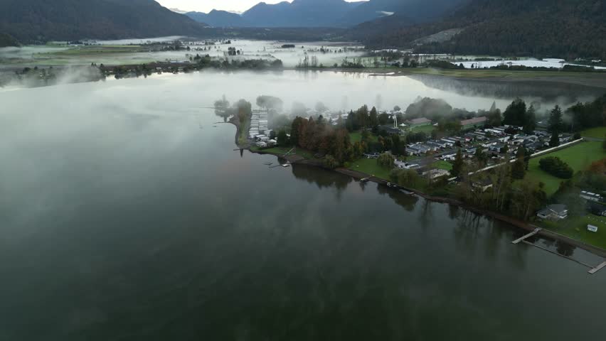 Misty Morning over Rural Lake Community in British Columbia, Canada