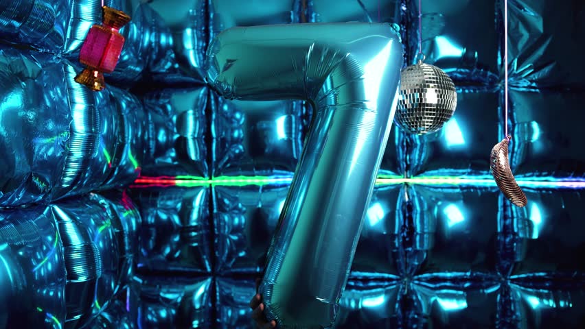 Bright and colorful party background with number 7 foil balloon, disco balls, and vibrant nightclub lighting. Perfect for birthdays and events.