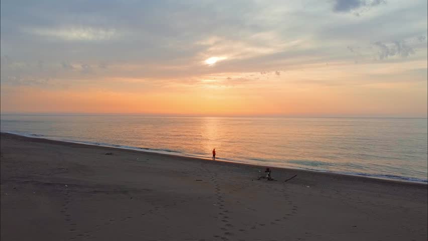 Mediterranean beach Aerial drone top down view of sea blue waves break and sand. Beautiful of sea water wave come to beach. Mesmerizing ocean waves sandy shoreline aerial top view. coastal landscape.