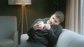 Disappointed Man Checking Empty Piggy Bank at Home - Concept of Financial Struggle and Low Savings - Powered by Shutterstock - Get 15% off with code: PIKWIZARD15