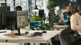 Happy employee starting first day at new job, unpacking belongings, meeting coworkers. Cheerful worker arriving in office, starting work on new company position, being welcomed by team, camera A - Powered by Shutterstock - Get 15% off with code: PIKWIZARD15