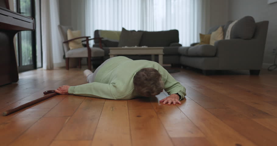 Accident, help and nurse with senior man and 911 phone call from fainting and injury. Support, nursing and emergency contact for medic with caregiver and male person on the ground from fall in house