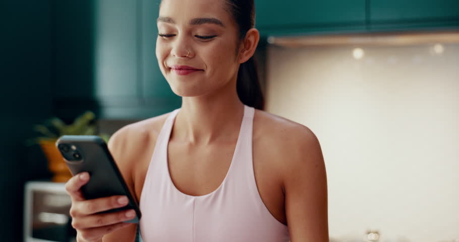 Blender, morning and phone with woman in kitchen for smoothie recipe, food blog and nutritionist. Wellness, breakfast and detox diet with person at home for cooking, weight loss and protein shake