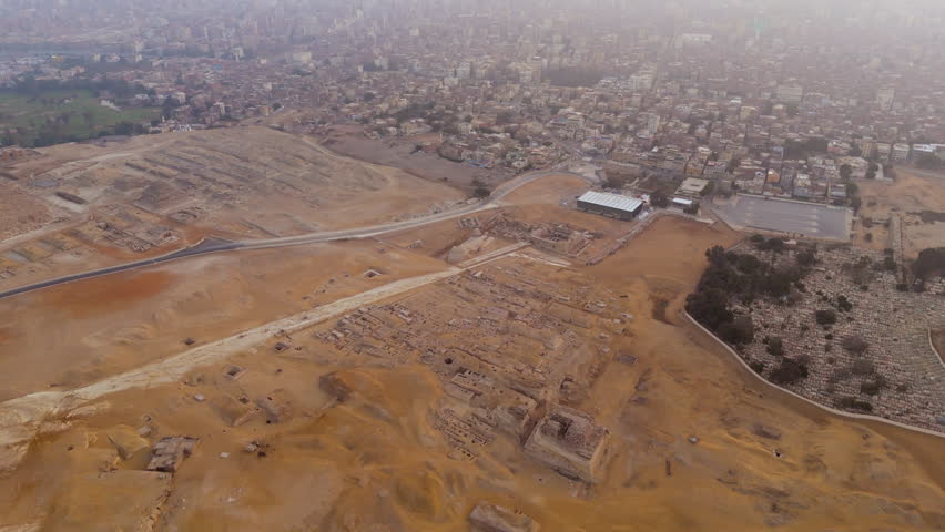 Ruins On The Archaeological Site At The Giza Plateau In Cairo, Egypt. Aerial Drone Shot