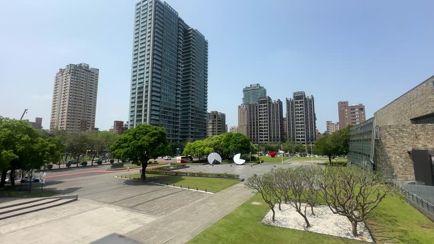 4K video of Taichung city in Taiwan buildings skyline skyscrapers park April Taiwanese blue sky sunny day