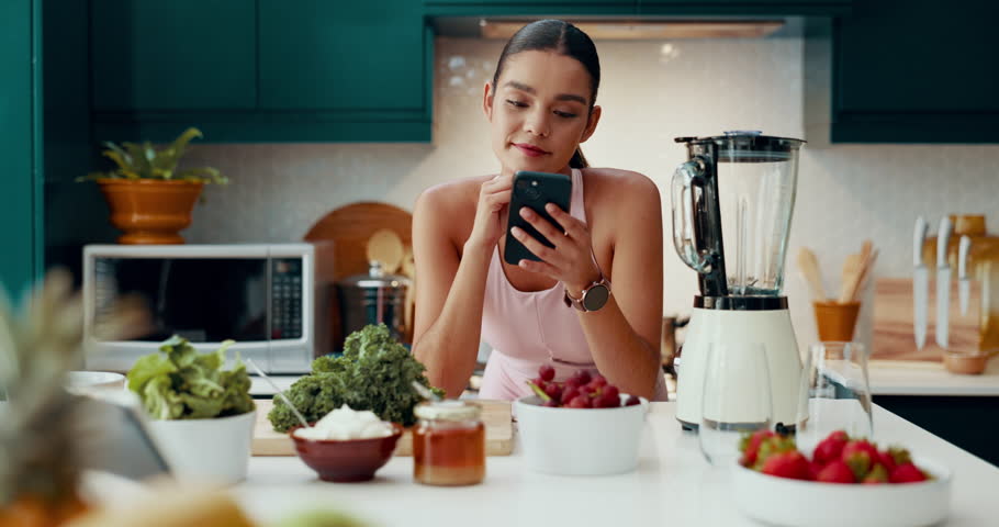 Happy woman, diet or healthy recipe with phone for online tutorial, tips or planning vegan meal at home. Female person, fitness or vegetarian with smile on mobile smartphone for natural organic snack