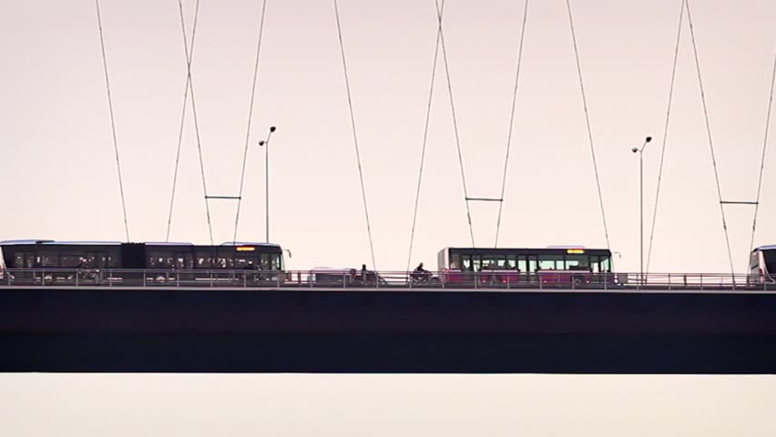 Buses on the cable bridge. Transportation Concept 
