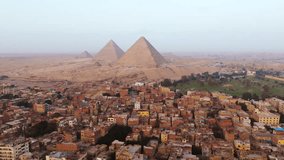 Panorama Of Giza City With The Pyramids of Giza In The Background In Egypt. Aerial Drone Shot - Powered by Shutterstock - Get 15% off with code: PIKWIZARD15