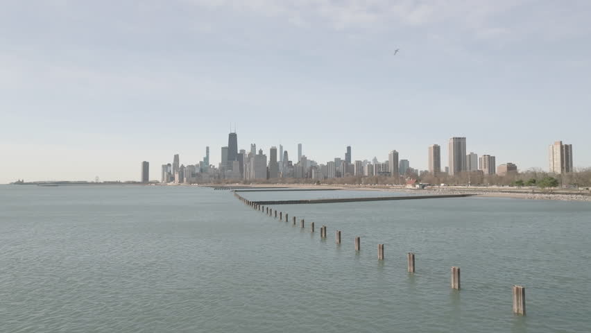 Aerial view of Chicago and Lake Michigan at sunrise.
