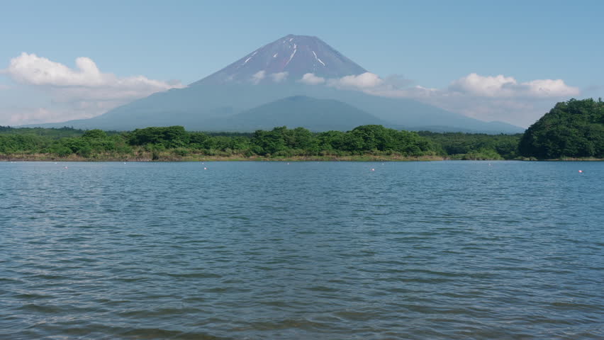 Mt. Fuji over Lake Shoji in Summer: Lake Shoji is one of the Fuji Five Lakes located in Yamanashi Prefecture, Japan