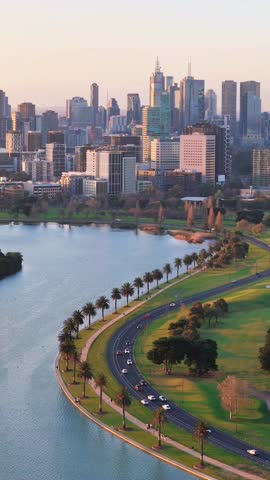 Aerial View of Melbourne Skyline and Albert Park Lake at Sunset