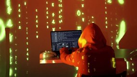 A mysterious hacker types rapidly in a glowing blue room, surrounded by cascading digital symbols. A white mask lies beside them, symbolizing anonymity in the world of cyber exploits - Powered by Shutterstock - Get 15% off with code: PIKWIZARD15