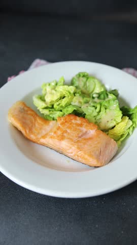 Salmon fried fish seafood dish fresh delicious gourmet food background on the table rustic food top view copy space keto paleo diet vegetarian food pescetarian diet