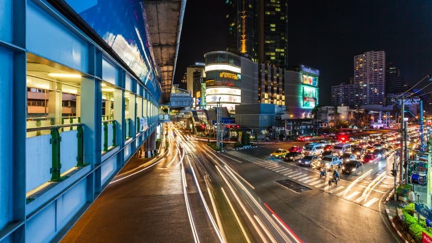 Traffic at night in Bangkok. Time lapse shot on Sukhumvit road Soi 21.