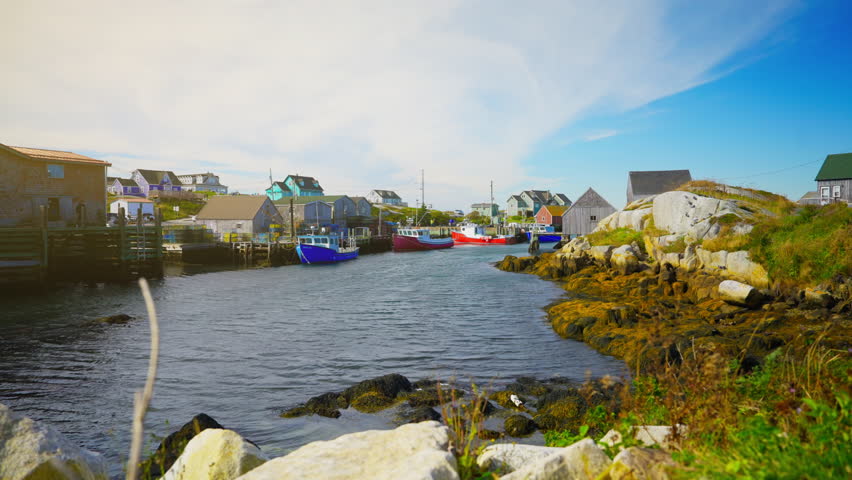 Peggy’s Cove in Nova Scotia, Canada. Charming fishing village with an iconic lighthouse.
Rugged granite rocks, colorful houses, and stunning views of the Atlantic. Peace, history, and natural beauty.