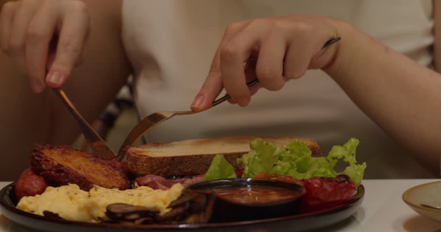 Vegan food. Woman eating delicious dessert in restaurant. Culinary concept. Asian woman vegetarian healthy eating salad avocado.