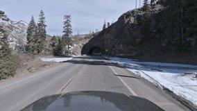 Immersive point of view footage driving through snowy mountain pass in Colorado along US550 aka the Million Dollar Highway in winter - Powered by Shutterstock - Get 15% off with code: PIKWIZARD15