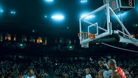 Dynamic basketball game in a packed indoor arena. Players compete with intensity and speed, showcasing teamwork, athleticism, and passion 3d made basketball stadium with animated crowd. - Powered by Shutterstock - Get 15% off with code: PIKWIZARD15
