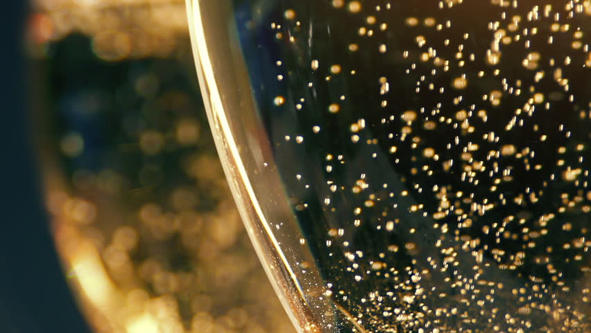 Champagne Bubbles In Glasses Macro Shot