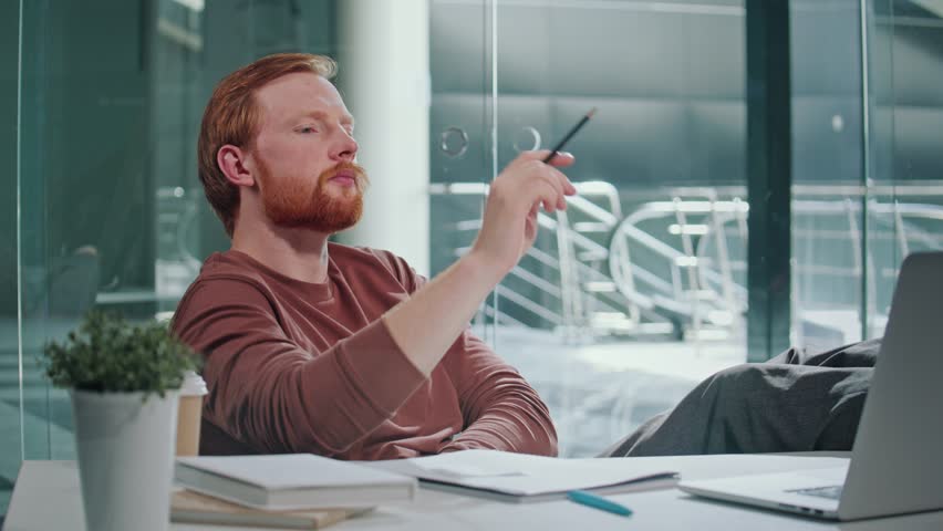 Entrepreneurial Challenge, Decision Fatigue, Mental Load. A Man Sits in His Office Staring at a Computer Screen, Struggling to Make a Tough Business Decision A Moment of Uncertainty, Internal Conflict