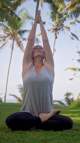 Fitness Woman Meditating in Relaxing Green Nature of Yoga Retreat. Beautiful Lifestyle of Coach Exercising Healthy Body and Mind at Yogi Training. Sport Leisure and Female Health of Alone Young Person