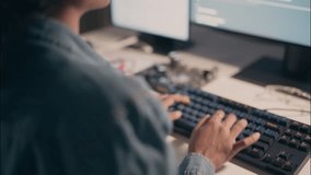 Close-up of asian woman’s hands typing code on mechanical keyboard at night, illuminated by screen light. Night coding session, engineer working overtime in tech environment. - Powered by Shutterstock - Get 15% off with code: PIKWIZARD15