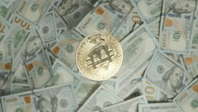 A Bitcoin Coin Spins Elegantly in a Slow Dolly Zoom Over a Background of Scattered US Dollar Bills, Highlighting the Concept of Cryptocurrency and Financial Innovation - Powered by Shutterstock - Get 15% off with code: PIKWIZARD15