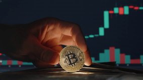 Hand Collecting Dollar Bills on the Table near Bitcoin Coin with Trading Chart in Background Showing Rising Market Trends - Powered by Shutterstock - Get 15% off with code: PIKWIZARD15