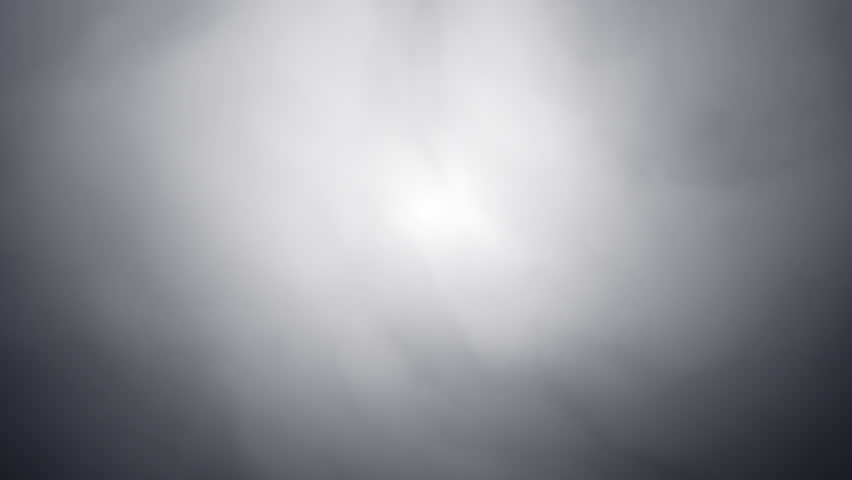 Overcast moody sky backdrop with slow motion cloud or smoke waves. Seamless loop. Smooth light and shadow gradient textured effect.