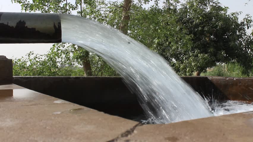 Groundwater Irrigation: High-Pressure Water Gushing from Tube Well in Agricultural Field | Arid Region Farming.