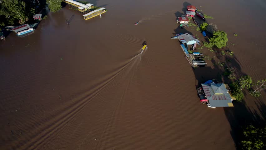 Aerial view of riverside town in the amazon jungle - Puerto Nariño, Colombia