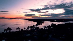Sunset Over the Amazon River in the Jungle - Amazonas, Puerto Nariño, Colombia - Powered by Shutterstock - Get 15% off with code: PIKWIZARD15