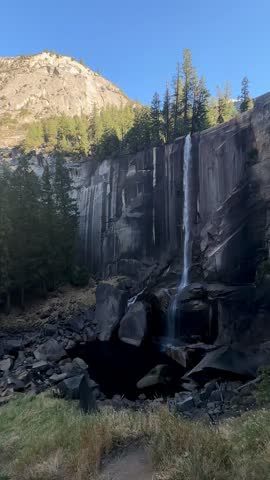 Vernal Fall Cascading Over Cliff on a Blue Day (Yosemite National Park, California, USA)
