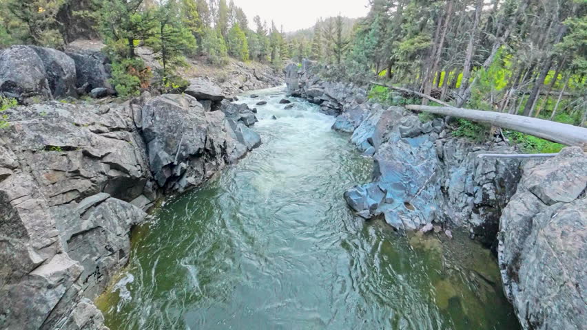 Waters of Hellroaring Creek Flow Through Canyon in Yellowstone National Park