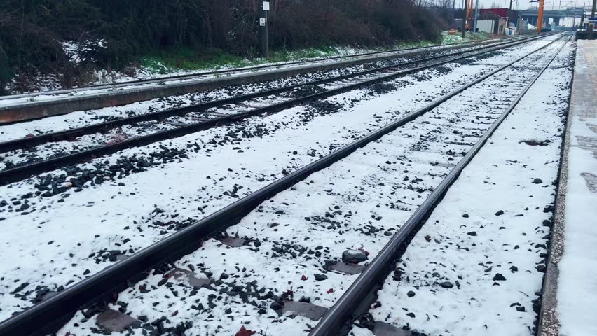 Ispartakule Train Station at snowy day in Istanbul, Turkey. (4K video)