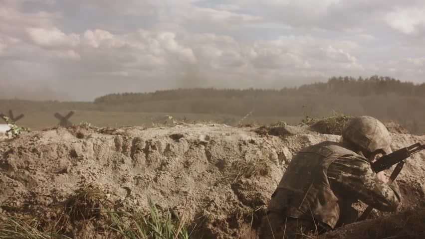 Soldier Running Through a War Zone with Explosions and Battle Tension