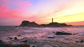 Beautiful Sunset Ke Ga Lighthouse with surf patted smoother reefs create clouds on sea as this is only ancient lighthouse is located on island in Vietnam - Powered by Shutterstock - Get 15% off with code: PIKWIZARD15