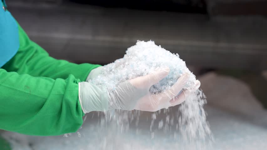 Plastic recycle center close-ups: from discarded plastic to high-quality fibers. Sustainable solutions captured in detail.