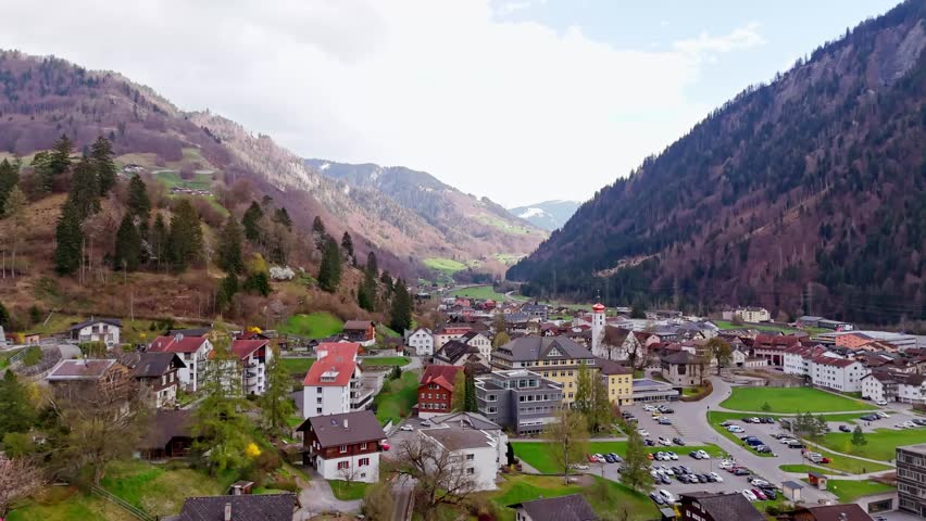 Scenic aerial view of Schiers village, nestled between mountains in Switzerland